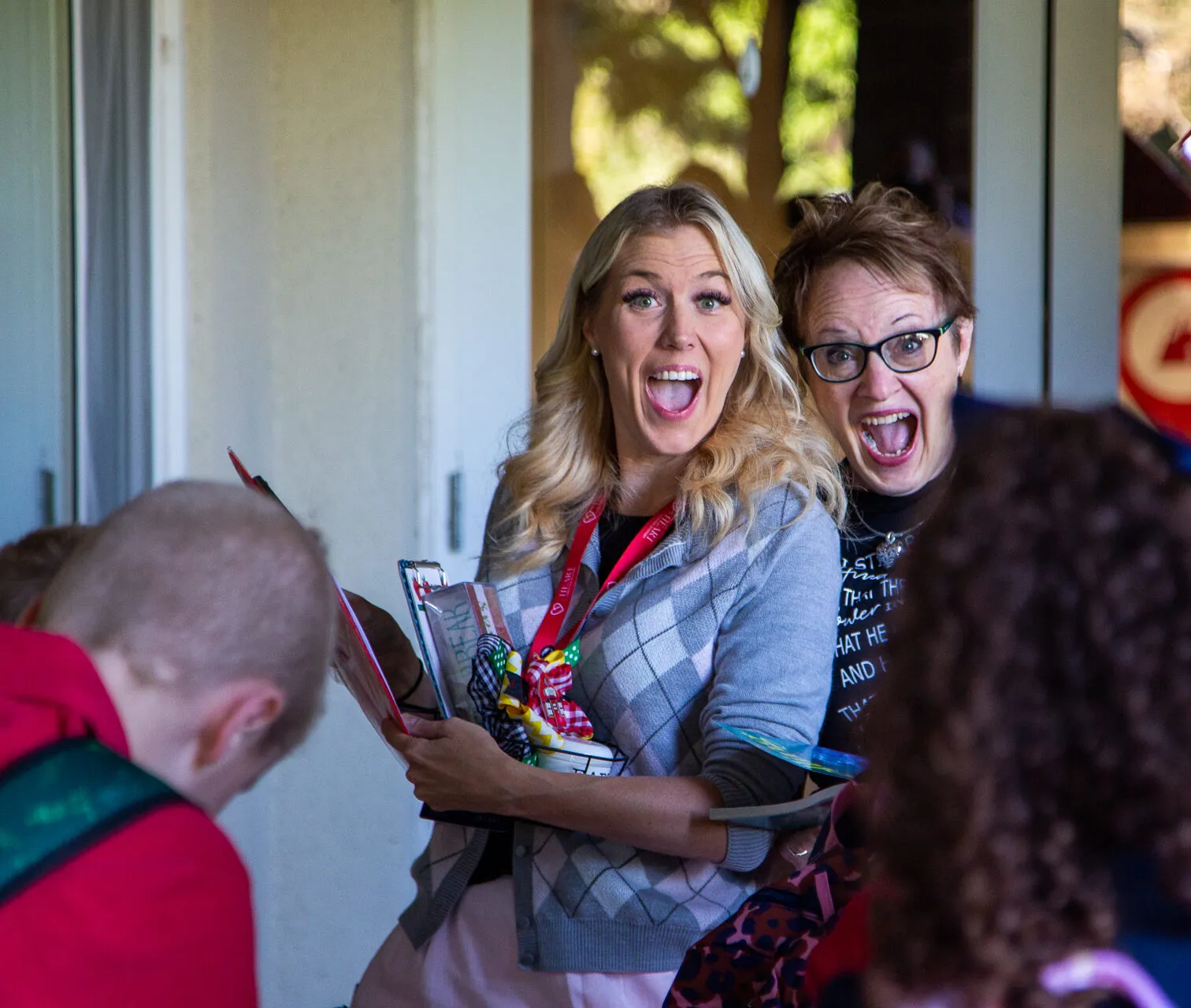 Moms and students gathering at school